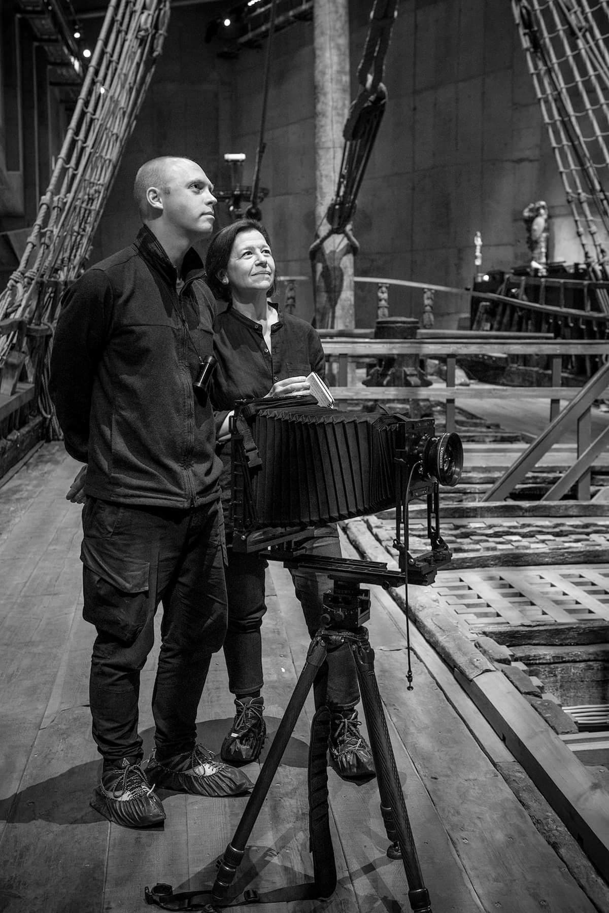 Joan Wickersham and Adam Davies on the deck of the ship Vasa.
