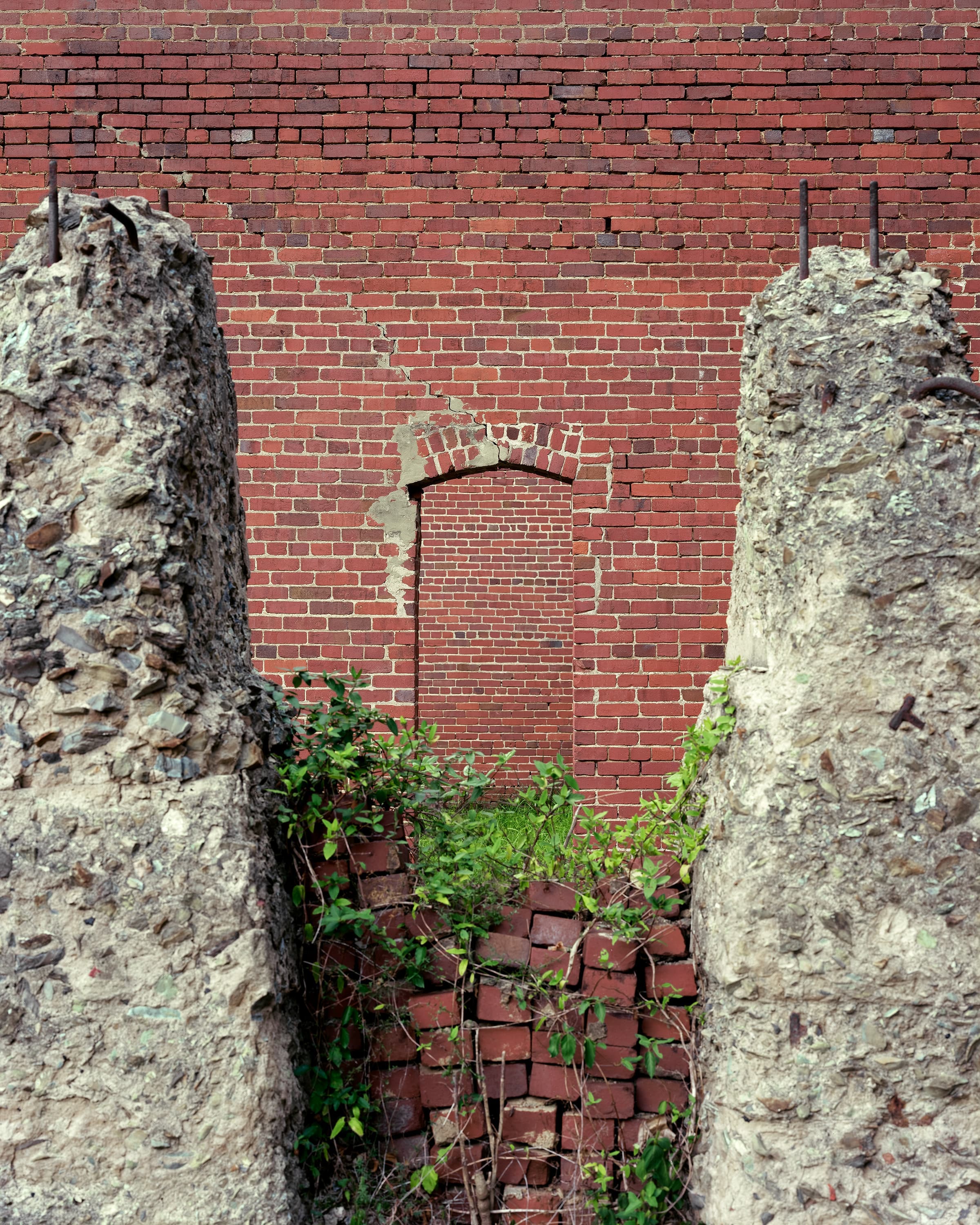 The image layers three different planes of view each containing bricks in different patterns an sizes.