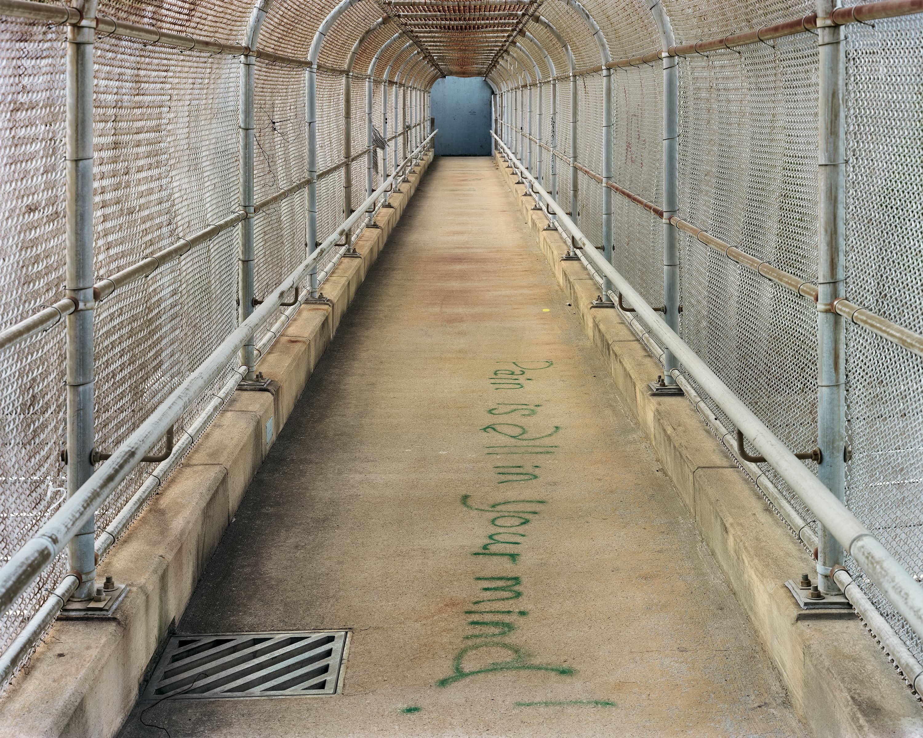 Phrase written on the floor of a pedestrian overpass in north Pittsburgh.